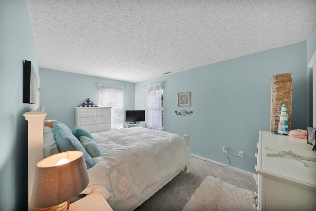 4654 Collingville Way, Columbus, OH 43230 - bedroom featuring carpet flooring, baseboards, and a textured ceiling