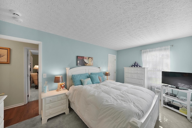 4654 Collingville Way, Columbus, OH 43230 - bedroom with a textured ceiling and carpet flooring