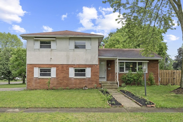 5754 Loganwood Rd, Columbus, OH 43229 - tri-level home with brick siding and a shingled roof