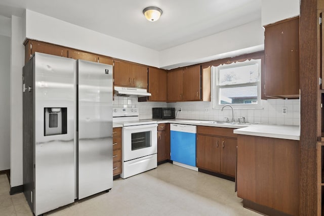 5754 Loganwood Rd, Columbus, OH 43229 - kitchen featuring dishwasher, stainless steel fridge with ice dispenser, white range with electric stovetop, a sink, and under cabinet range hood