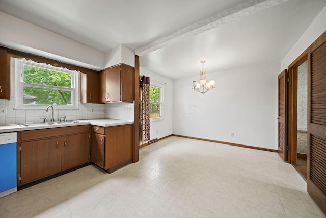 5754 Loganwood Rd, Columbus, OH 43229 - kitchen with dishwasher, a sink, healthy amount of natural light, and a chandelier