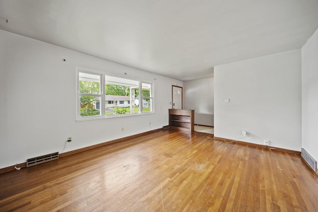 5754 Loganwood Rd, Columbus, OH 43229 - unfurnished room featuring wood finished floors and baseboards