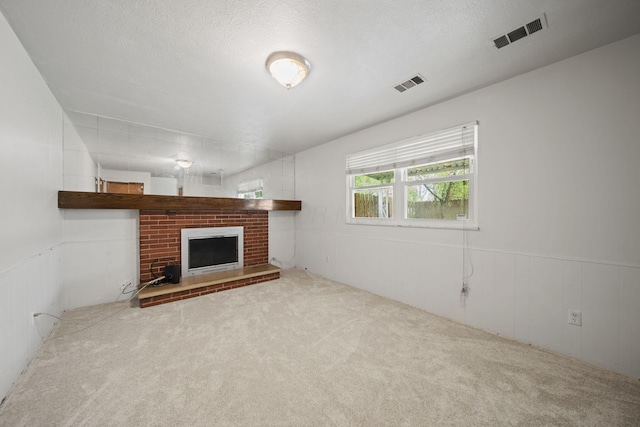 5754 Loganwood Rd, Columbus, OH 43229 - unfurnished living room with carpet floors, a fireplace, and a wainscoted wall