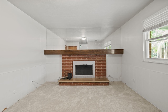 5754 Loganwood Rd, Columbus, OH 43229 - unfurnished living room with a fireplace, carpet, and wainscoting