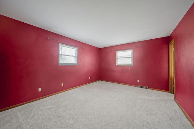 5754 Loganwood Rd, Columbus, OH 43229 - carpeted empty room with plenty of natural light and baseboards