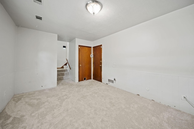5754 Loganwood Rd, Columbus, OH 43229 - carpeted empty room featuring stairway