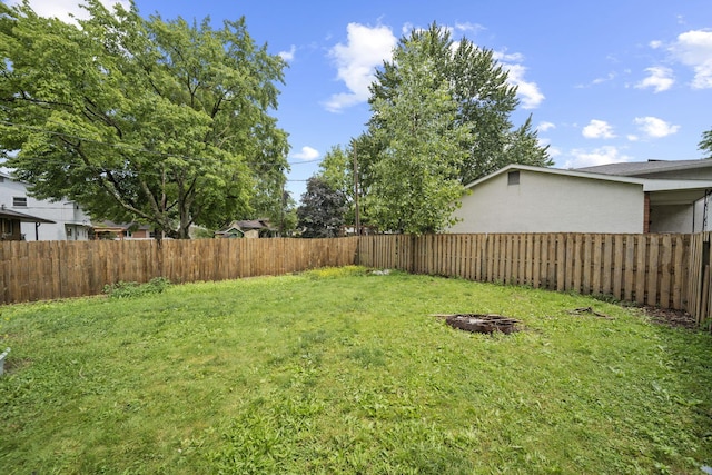 5754 Loganwood Rd, Columbus, OH 43229 - view of yard featuring a fire pit