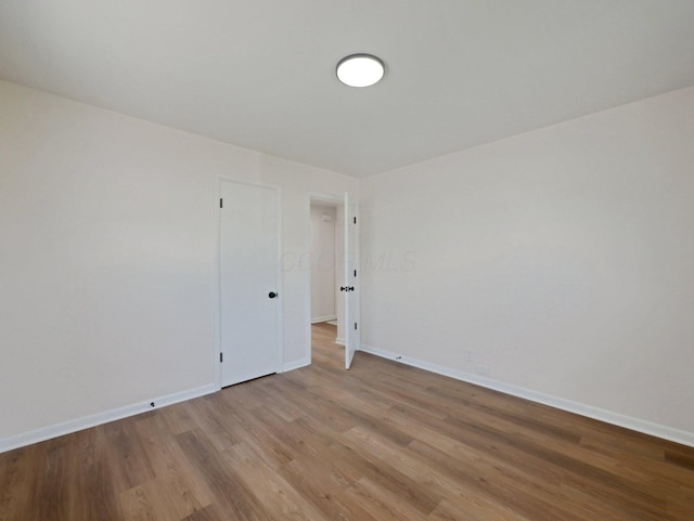 68 Mary St, West Jefferson, OH 43162 - unfurnished room with light wood finished floors and baseboards