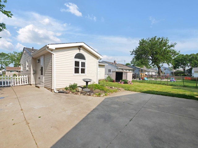 68 Mary St, West Jefferson, OH 43162 - view of property exterior with a patio