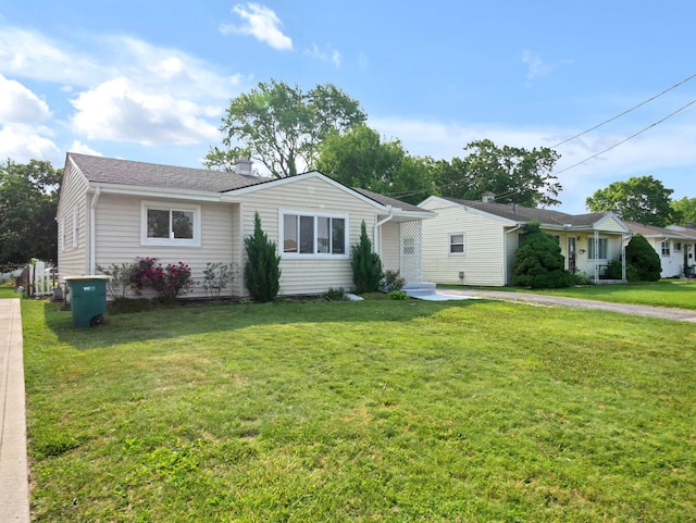 68 Mary St, West Jefferson, OH 43162 - ranch-style home with a front lawn and a chimney