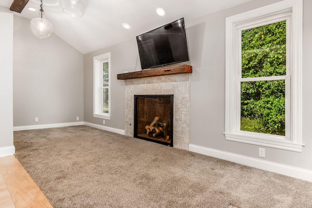 6900 Waterloo Rd NW, Canal Winchester, OH 43110 - unfurnished living room featuring vaulted ceiling, a fireplace, carpet flooring, and recessed lighting