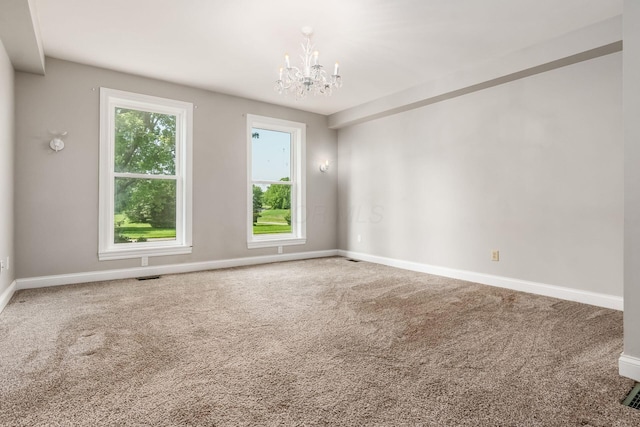 6900 Waterloo Rd NW, Canal Winchester, OH 43110 - carpeted spare room featuring a chandelier and baseboards