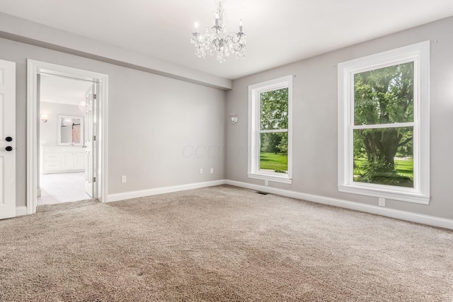 6900 Waterloo Rd NW, Canal Winchester, OH 43110 - unfurnished room with a chandelier and carpet flooring