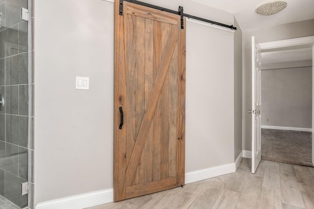 6900 Waterloo Rd NW, Canal Winchester, OH 43110 - bathroom featuring wood finished floors and tiled shower