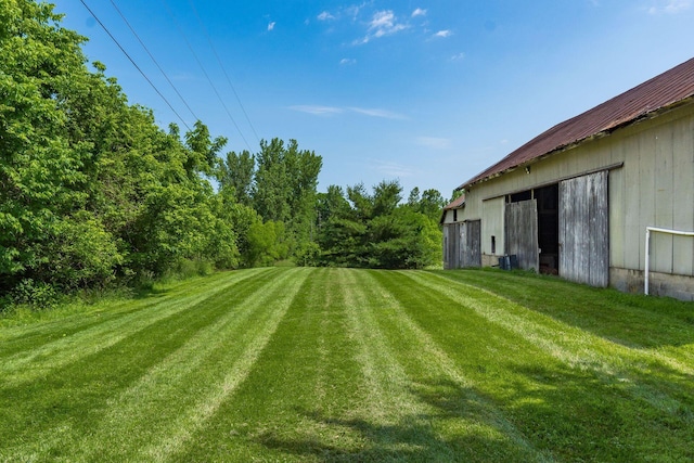6900 Waterloo Rd NW, Canal Winchester, OH 43110 - view of green lawn featuring an outdoor structure and an outbuilding