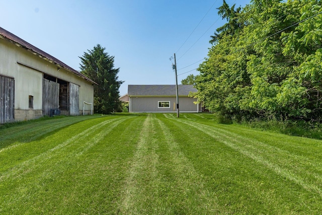 6900 Waterloo Rd NW, Canal Winchester, OH 43110 - view of green lawn featuring an outbuilding