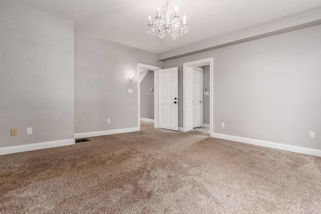 6900 Waterloo Rd NW, Canal Winchester, OH 43110 - carpeted spare room featuring a chandelier and baseboards