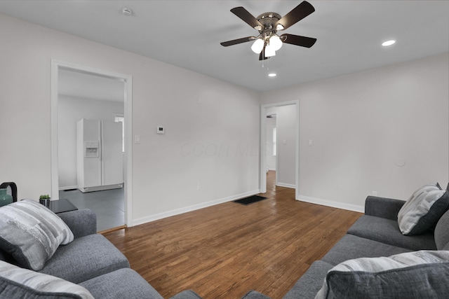 2217 Grasmere Ave, Columbus, OH 43211 - living area featuring a ceiling fan, wood finished floors, baseboards, and recessed lighting