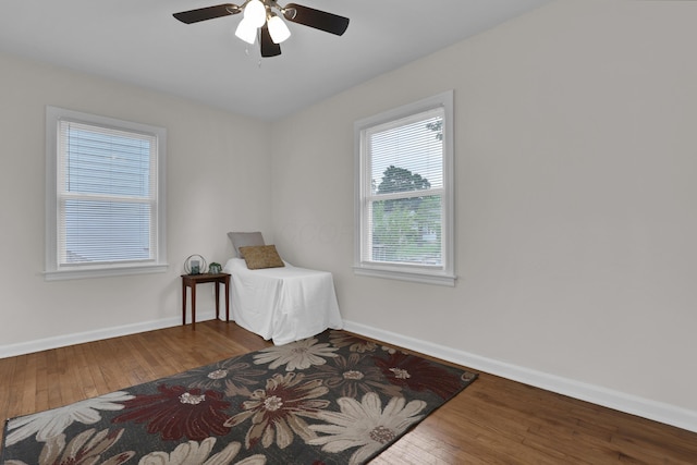 2217 Grasmere Ave, Columbus, OH 43211 - bedroom with hardwood / wood-style floors, baseboards, and a ceiling fan