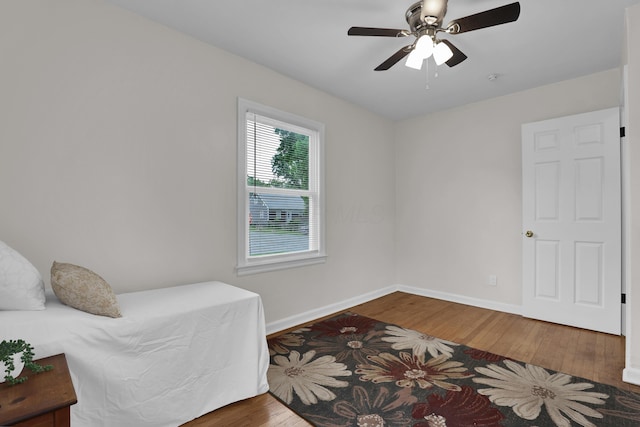 2217 Grasmere Ave, Columbus, OH 43211 - sitting room featuring wood finished floors, ceiling fan, and baseboards