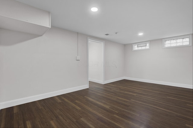 2217 Grasmere Ave, Columbus, OH 43211 - below grade area with dark wood-style floors, baseboards, and recessed lighting