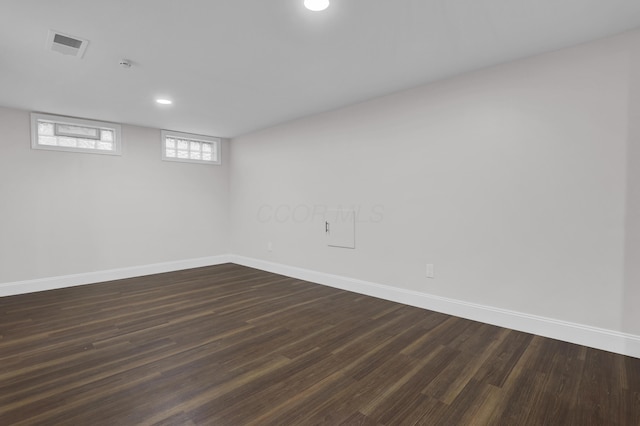 2217 Grasmere Ave, Columbus, OH 43211 - basement with baseboards, dark wood-style flooring, and recessed lighting