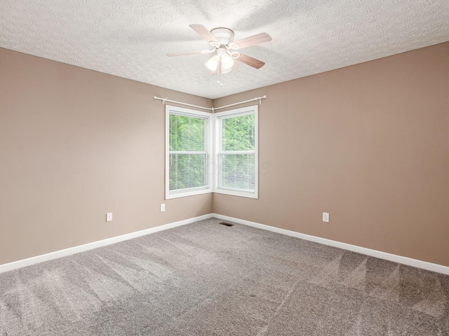 7034 Kellogg Dr, Powell, OH 43065 - carpeted empty room featuring a textured ceiling, ceiling fan, and baseboards