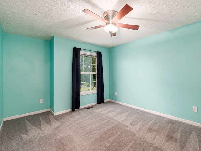7034 Kellogg Dr, Powell, OH 43065 - spare room with carpet flooring, a ceiling fan, a textured ceiling, and baseboards