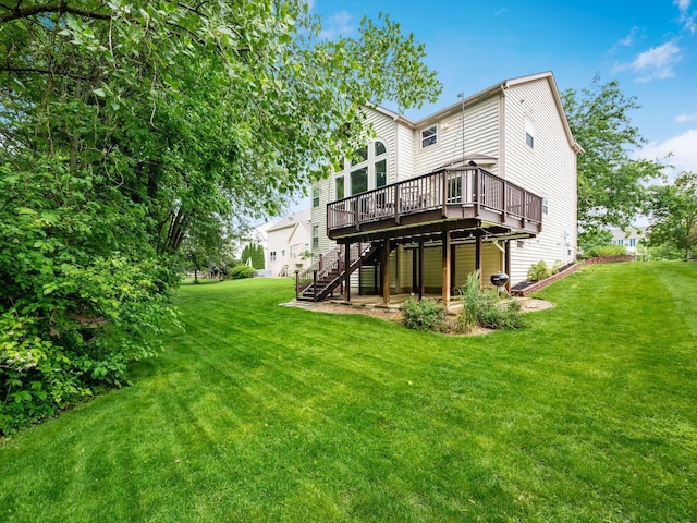 7034 Kellogg Dr, Powell, OH 43065 - back of house with a deck, stairs, and a lawn