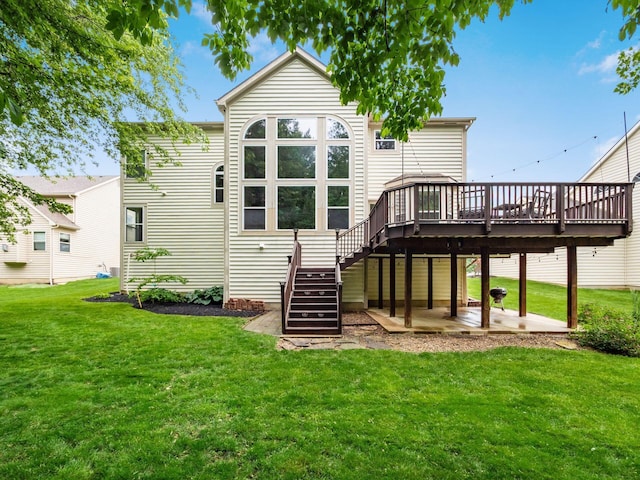 7034 Kellogg Dr, Powell, OH 43065 - rear view of property with a wooden deck, stairway, a lawn, and a patio