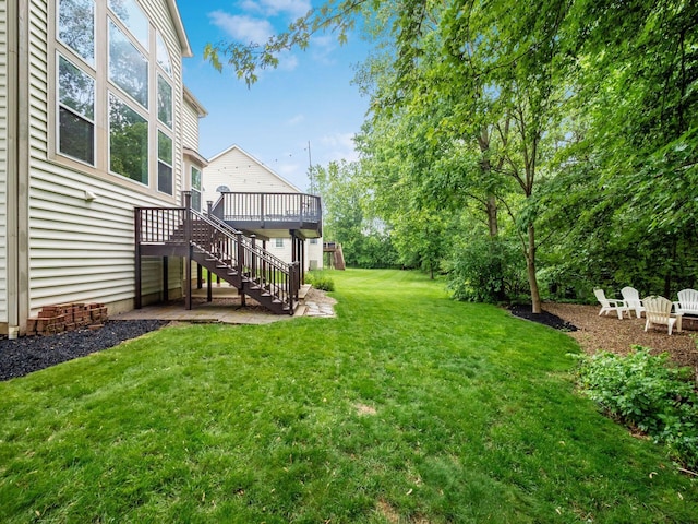 7034 Kellogg Dr, Powell, OH 43065 - view of grassy yard featuring stairs and a deck