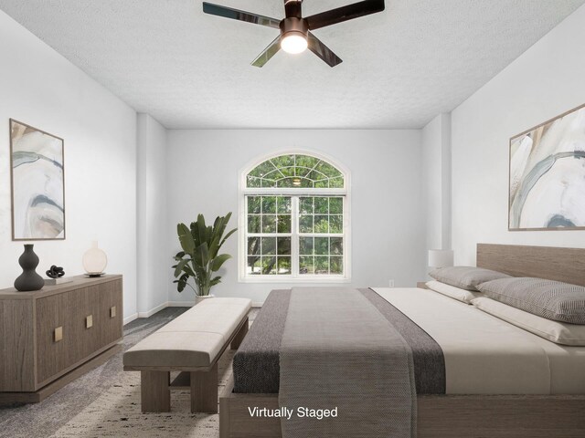 7034 Kellogg Dr, Powell, OH 43065 - bedroom featuring a textured ceiling and a ceiling fan