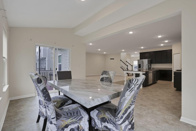 1137 Legacy Ln, Pataskala, OH 43062 - dining area featuring stairway, recessed lighting, baseboards, vaulted ceiling, and healthy amount of natural light