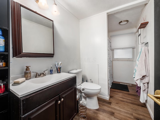 334 Wittenberg St, Columbus, OH 43230 - bathroom featuring vanity, wood finished floors, toilet, and a shower with shower curtain