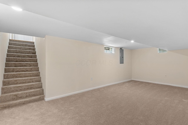 1345 E Deshler Ave, Columbus, OH 43206 - below grade area with electric panel, carpet, stairs, baseboards, and recessed lighting