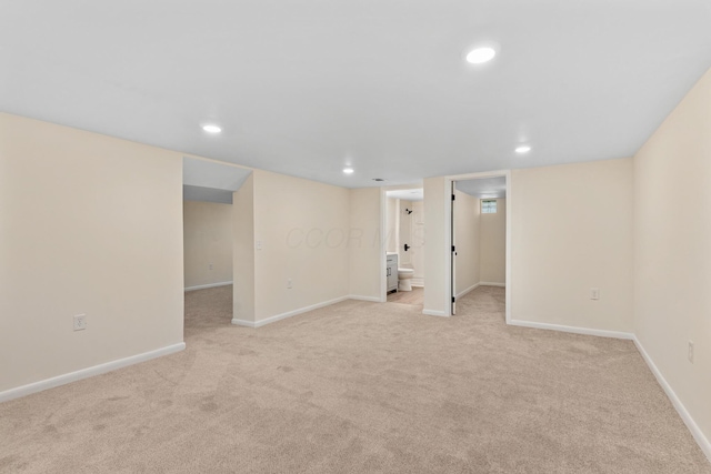 1345 E Deshler Ave, Columbus, OH 43206 - finished below grade area with light carpet, recessed lighting, and baseboards