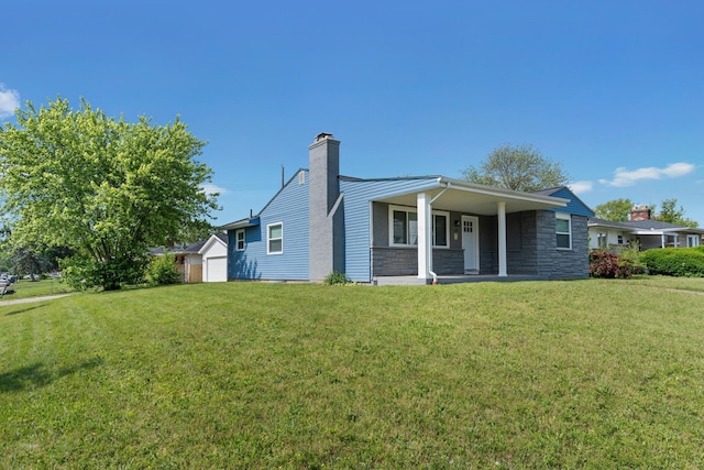 1345 E Deshler Ave, Columbus, OH 43206 - view of front facade featuring a front lawn, a chimney, covered porch, a garage, and stone siding
