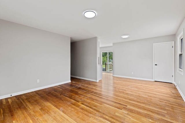 1001 S Harris Ave, Columbus, OH 43204 - spare room with light wood-type flooring and baseboards
