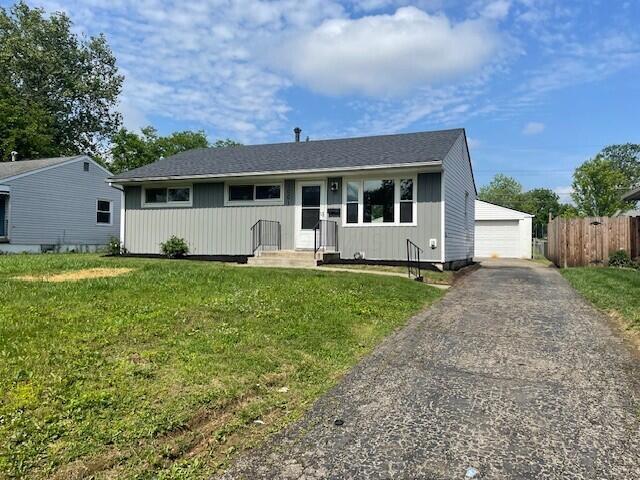 1001 S Harris Ave, Columbus, OH 43204 - view of front of home featuring a detached garage and an outbuilding