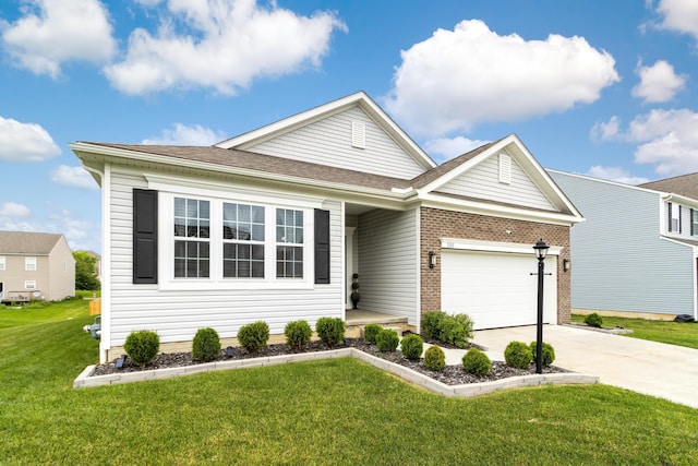 1333 Andy Way, Pataskala, OH 43062 - view of front of property featuring driveway, an attached garage, a front lawn, and brick siding