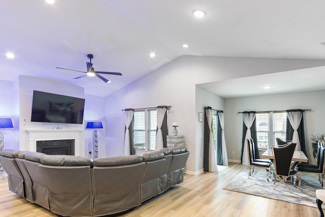 1333 Andy Way, Pataskala, OH 43062 - living room featuring lofted ceiling, light wood finished floors, a ceiling fan, a fireplace, and recessed lighting