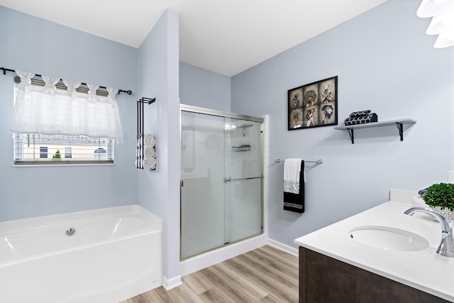 1333 Andy Way, Pataskala, OH 43062 - bathroom with a shower stall, a bath, wood finished floors, and double vanity