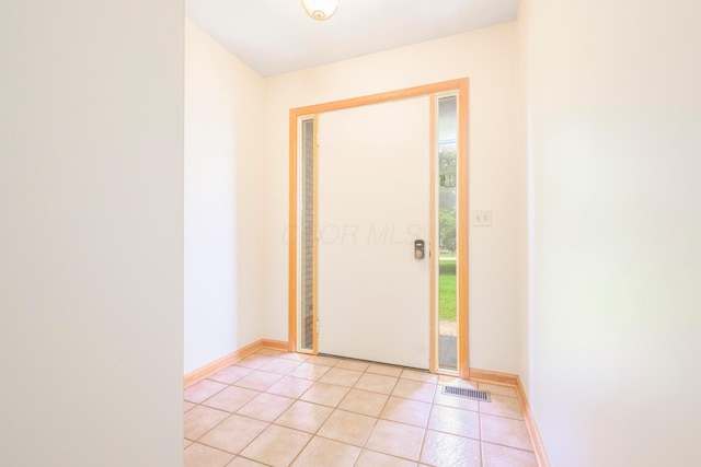 20 Snider Rd, New Carlisle, OH 45344 - foyer featuring light tile patterned floors and baseboards