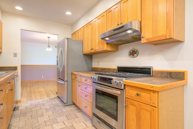 20 Snider Rd, New Carlisle, OH 45344 - kitchen featuring under cabinet range hood, stainless steel appliances, tile counters, recessed lighting, and pendant lighting