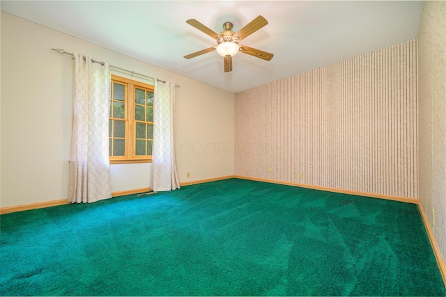 20 Snider Rd, New Carlisle, OH 45344 - unfurnished room featuring wallpapered walls, ceiling fan, baseboards, and carpet floors