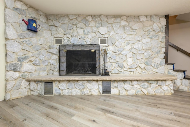20 Snider Rd, New Carlisle, OH 45344 - detailed view of wood finished floors and a fireplace