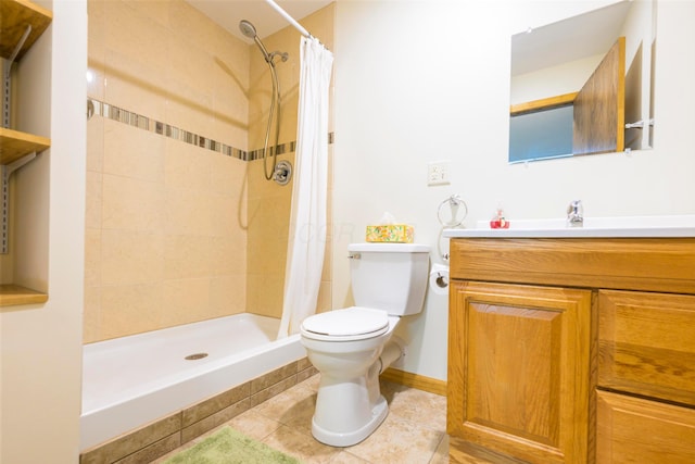 20 Snider Rd, New Carlisle, OH 45344 - bathroom with toilet, vanity, a tile shower, and tile patterned flooring
