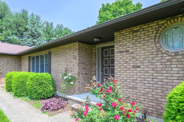 20 Snider Rd, New Carlisle, OH 45344 - view of exterior entry featuring brick siding