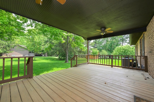 20 Snider Rd, New Carlisle, OH 45344 - wooden deck featuring a ceiling fan and a yard