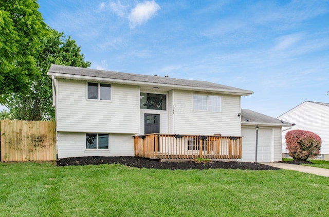 3944 Ardath Rd, Columbus, OH 43228 - split foyer home with an attached garage, a wooden deck, and concrete driveway